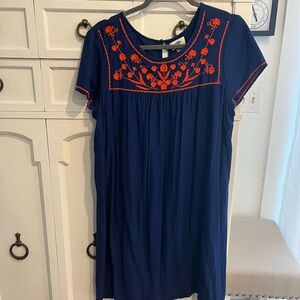 Pretty blue dress with orange embroidery